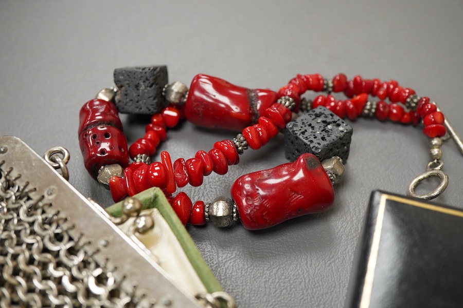 A collection of jewels, comprising: an early 20th century ruby, diamond and seed pearl stick pin, stamped 15ct, length 5.9cm, gross weight approximately 1.5 grams, one diamond deficient; together with a pair of ear clips